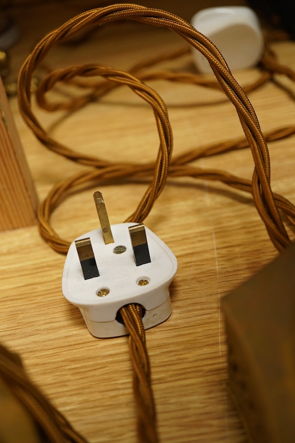 A pair of ruby glass, enamel and gilt metal table lamps, 57cm